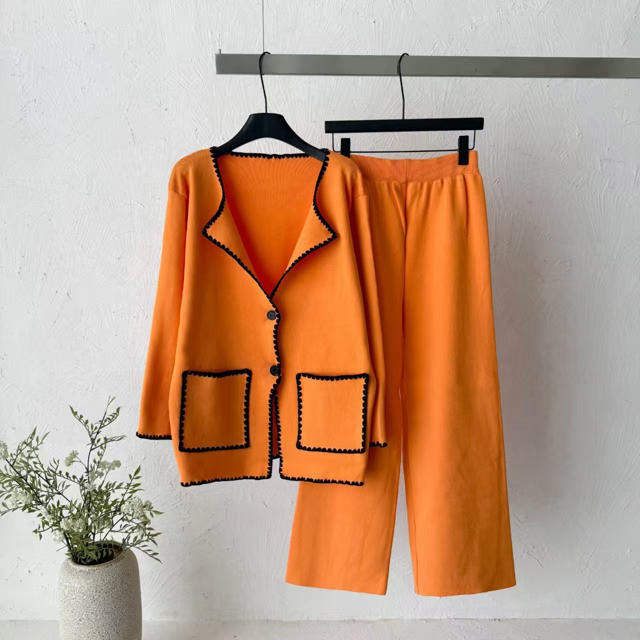Cross border 2026 early autumn new crochet knitted suit women's loose cardigan wide leg pants two-piece set commuting fashion