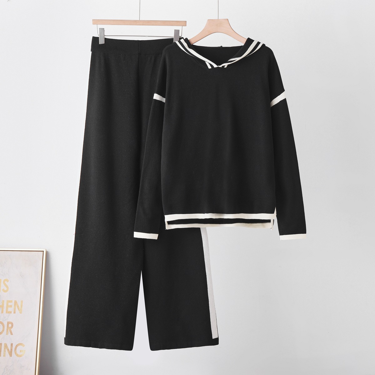 Cross border fashion color blocked hooded knitted suit 2026 women's loose temperament slimming sweater wide leg pants two-piece set