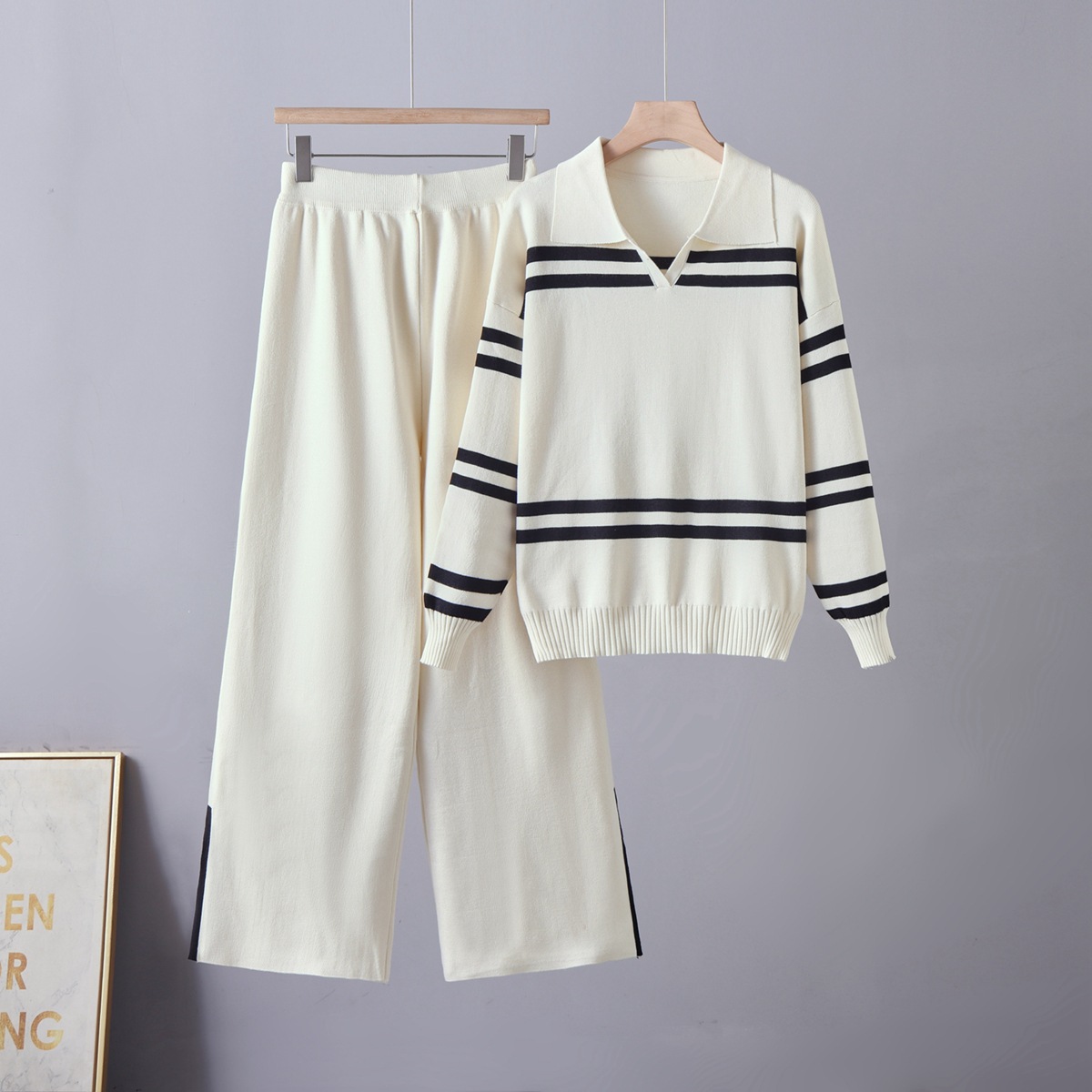 Cross border 2026 new casual contrasting striped lapel women's knitted sweater loose and versatile lazy style knitted suit Cross border 2026 new casual contrasting striped lapel women's knitted sweater loose and versatile lazy style knitted suit