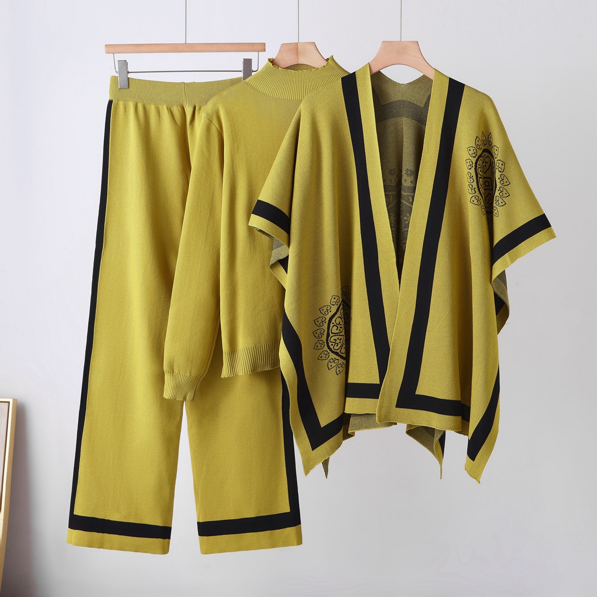 Cross border leisure suit women's autumn and winter new style temperament lazy style knitted sweater shawl cape wide leg pants three piece set Cross border leisure suit women's autumn and winter new style temperament lazy style knitted sweater shawl cape wide leg pants three piece set