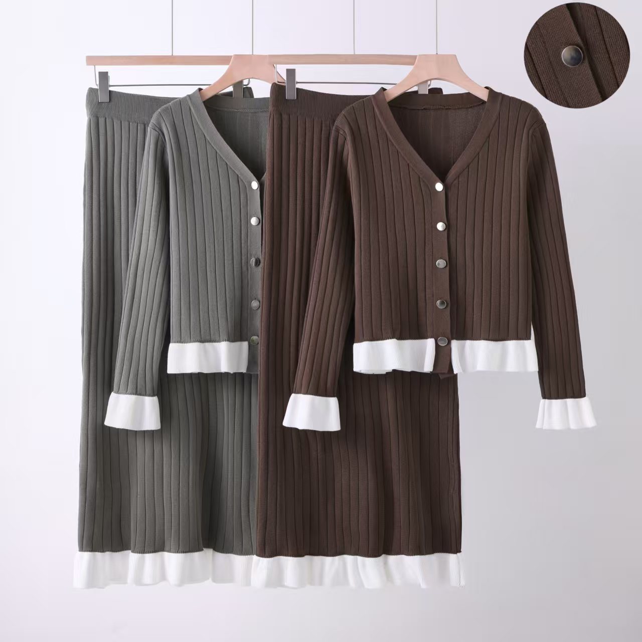 Fashion suit women's design sense V-neck color blocked single breasted long sleeved knitted cardigan women's two-piece set versatile half skirt