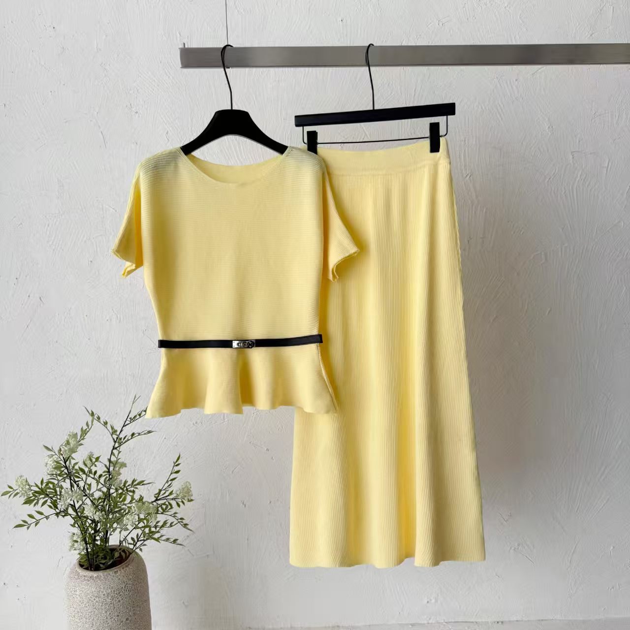 2026 new pit stripe knitted suit women's waist cinched ruffle edge top high waist straight tube half skirt two-piece set temperament 2026 new pit stripe knitted suit women's waist cinched ruffle edge top high waist straight tube half skirt two-piece set temperament