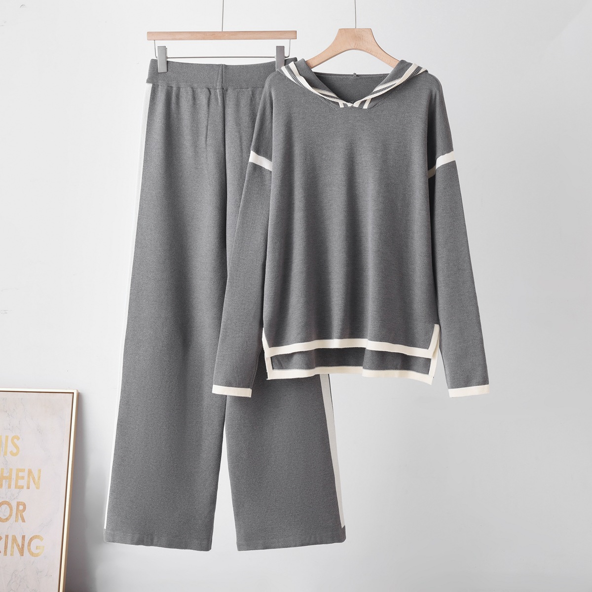 Cross border fashion color blocked hooded knitted suit 2026 women's loose temperament slimming sweater wide leg pants two-piece set Cross border fashion color blocked hooded knitted suit 2026 women's loose temperament slimming sweater wide leg pants two-piece set