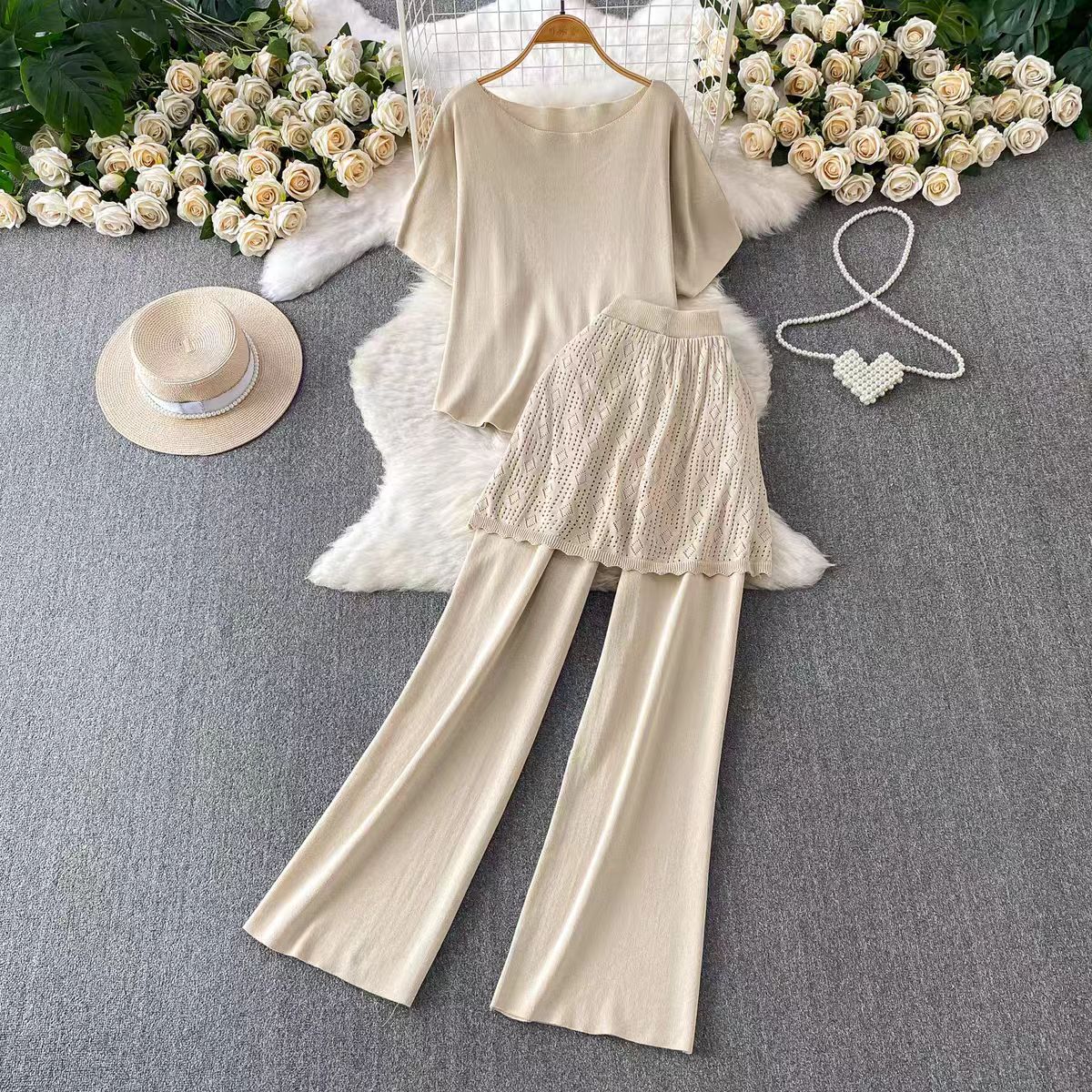 French socialite temperament round neck T-shirt top+niche hollowed out fart curtain hiding flesh and slimming knitted wide leg pants two-piece set