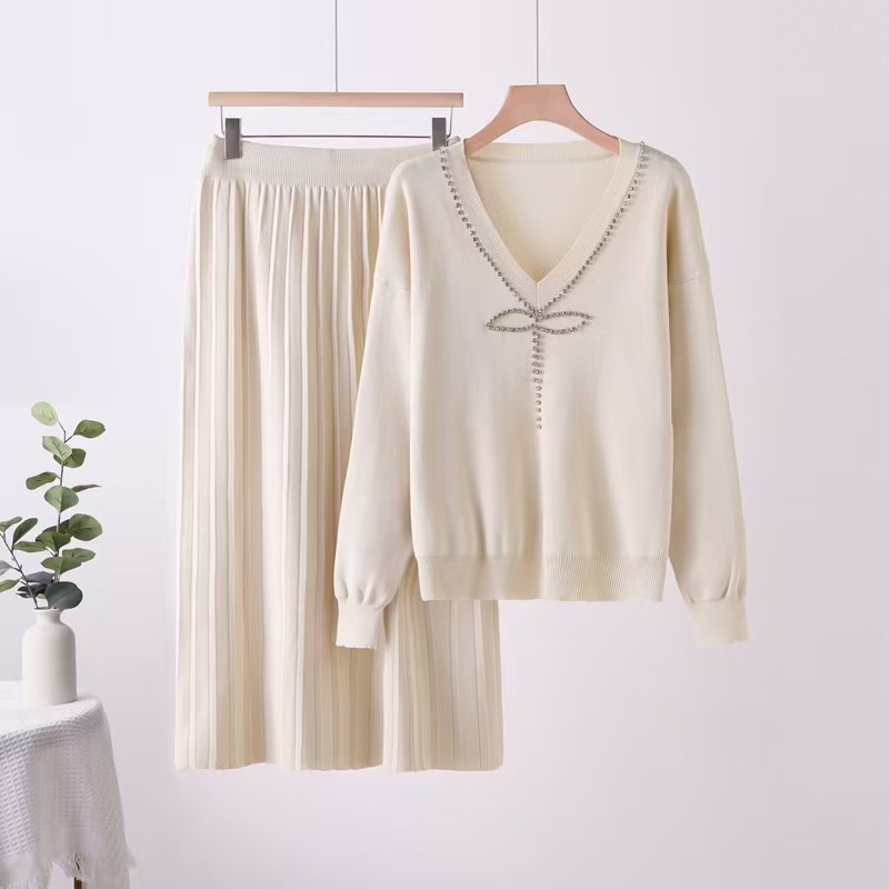 Fashionable two-piece women's autumn and winter light luxury goddess style temperament bow V-neck knitted sweatshirt set pleated long skirt Fashionable two-piece women's autumn and winter light luxury goddess style temperament bow V-neck knitted sweatshirt set pleated long skirt