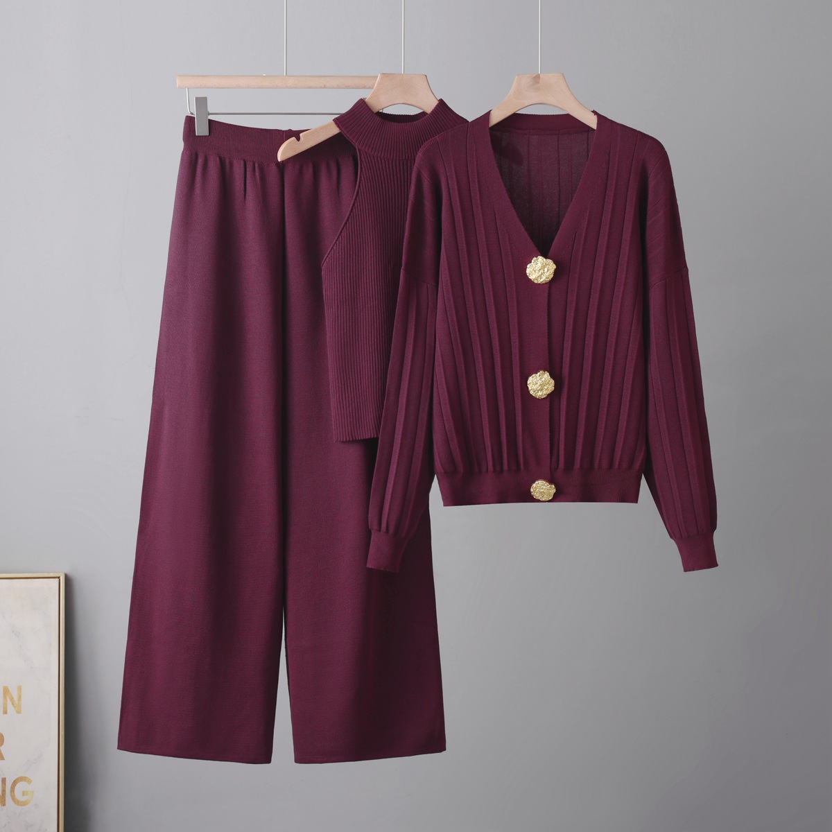 Foreign trade big metal button knitted set women's autumn and winter casual cardigan sweater vest half skirt three piece set European and American