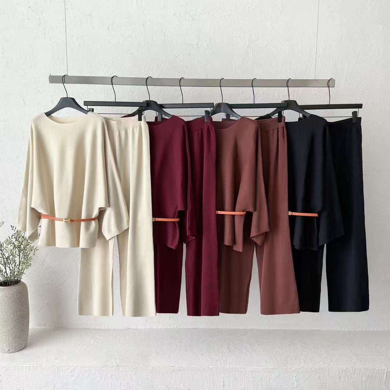 Cross border temperament commuting knitted two-piece set for women with concealed meat bat sleeves, top with hanging wide leg pants, high-end set