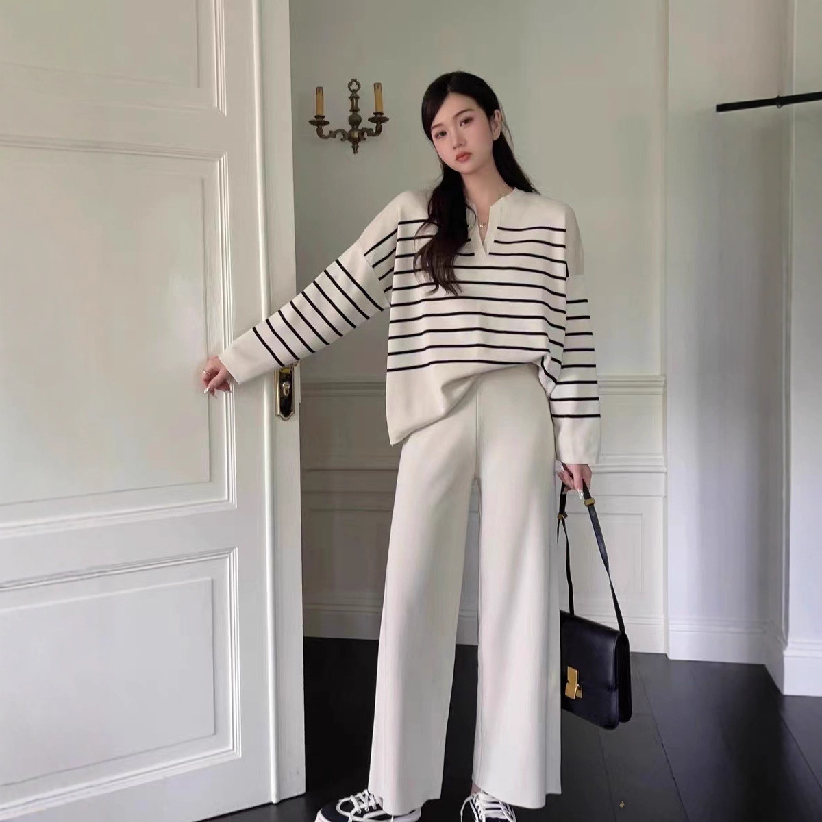 Fashion suit women's Korean version loose striped knitted top two-piece set, casual high waisted drop feeling knitted wide leg pants