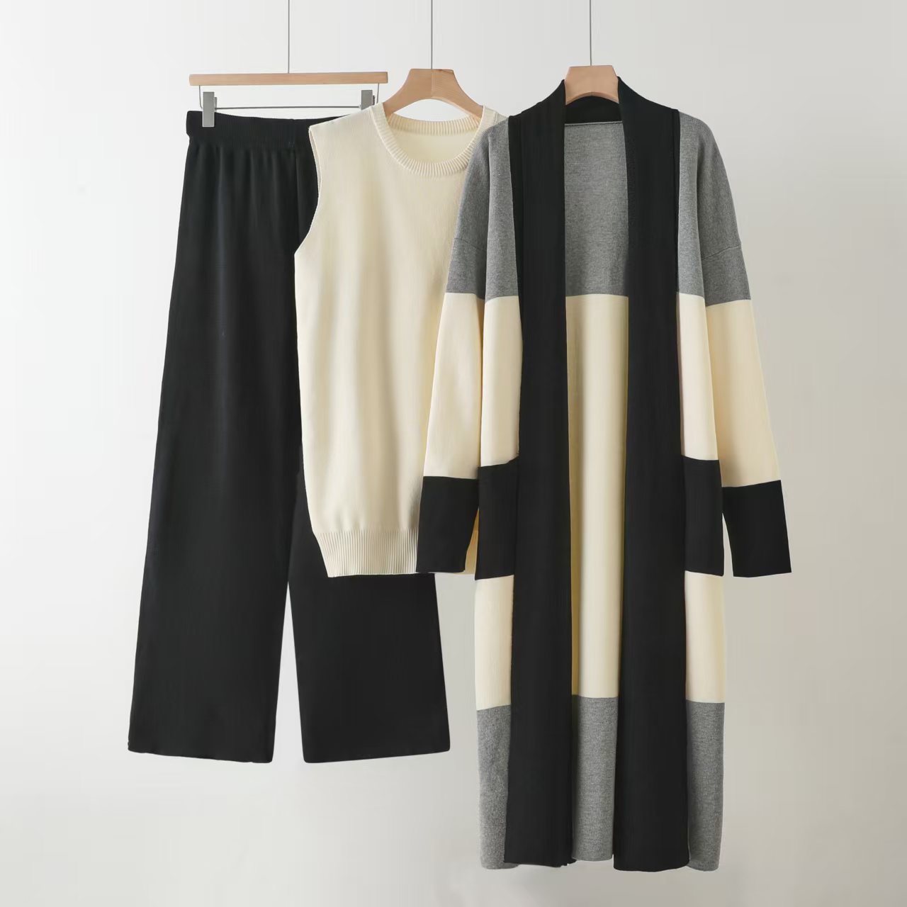 Cross border European and American fashion 2025 loose cardigan jacket knitted three piece set vest wide leg pants casual lazy suit Cross border European and American fashion 2025 loose cardigan jacket knitted three piece set vest wide leg pants casual lazy suit