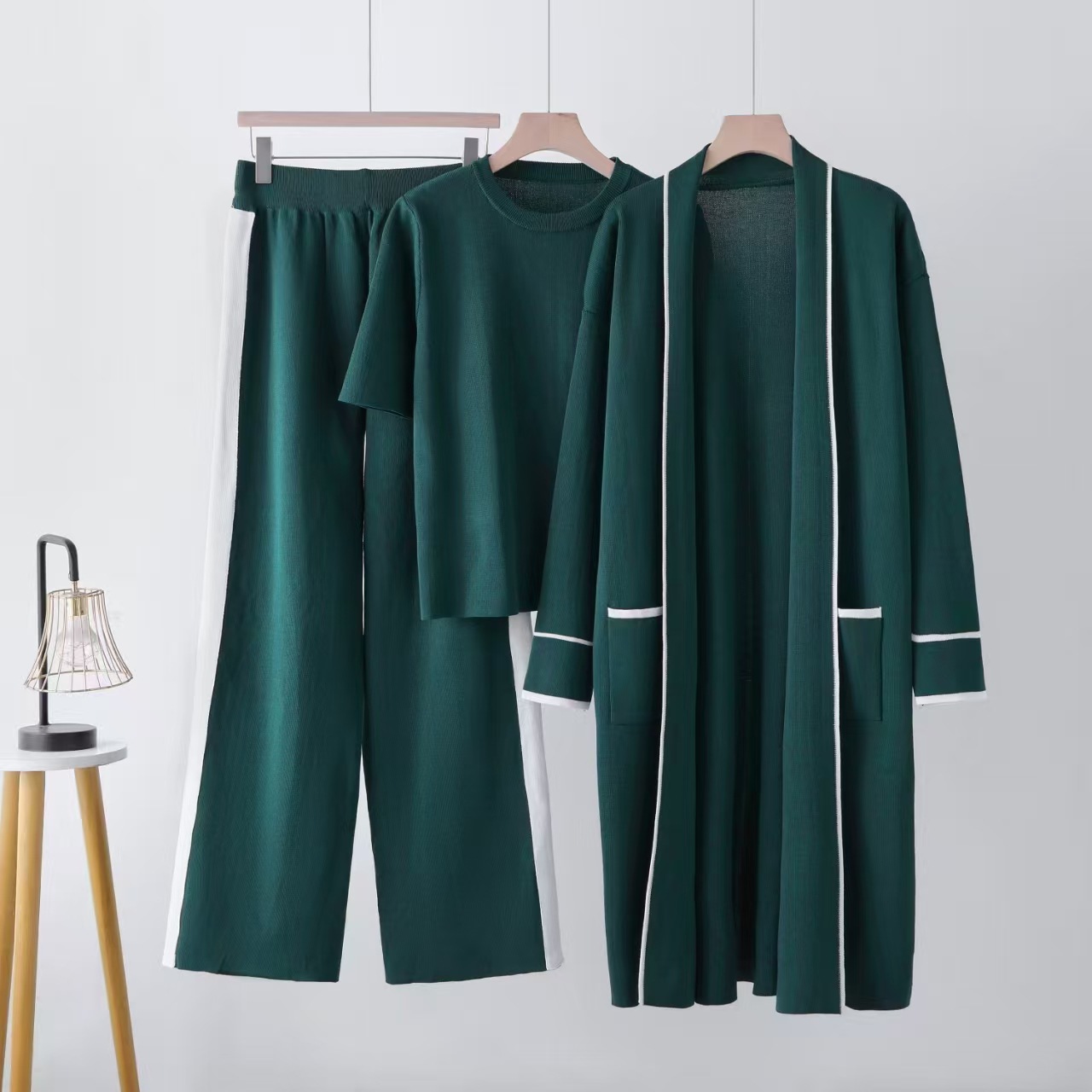 Ladies' fashionable three piece set for autumn and winter interior, round neck short sleeved knitted top, loose sweater jacket, long pants