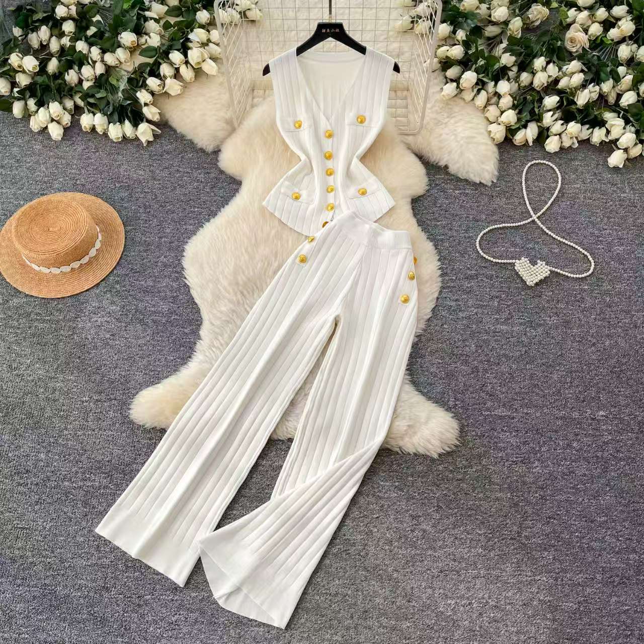 Xiaoxiang style knitted V-neck two-piece set for women's summer slim fit vest, metal buckle high waisted wide leg pants, high-end feel