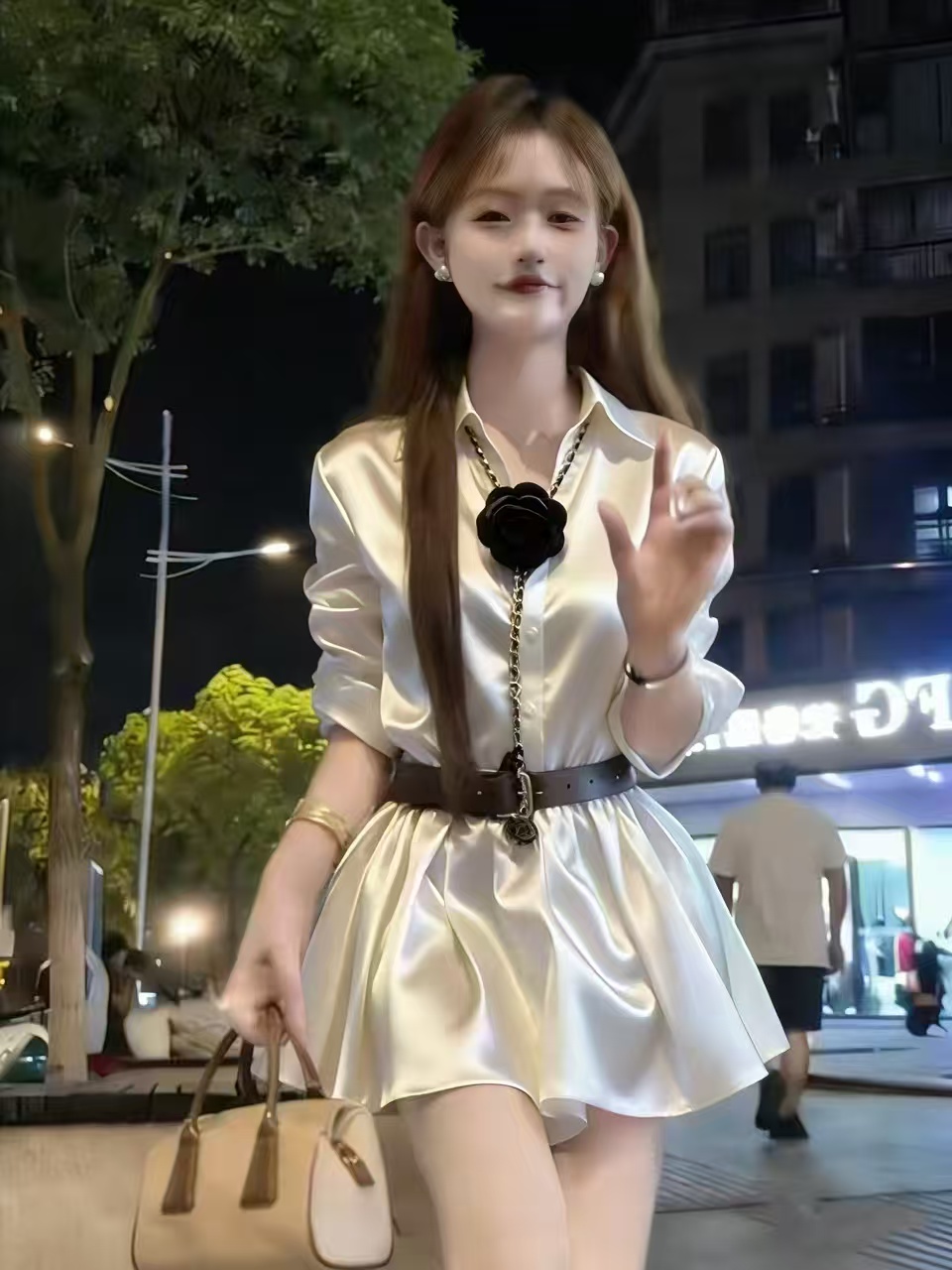 Korean style fashion lapel three-dimensional flower long sleeved shirt for women in spring 2026, paired with a waistband, cinched waist, slimming skirt top