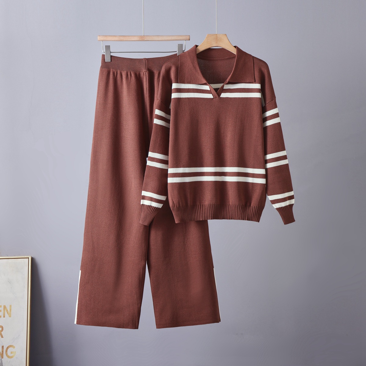 Cross border 2026 new casual contrasting striped lapel women's knitted sweater loose and versatile lazy style knitted suit Cross border 2026 new casual contrasting striped lapel women's knitted sweater loose and versatile lazy style knitted suit