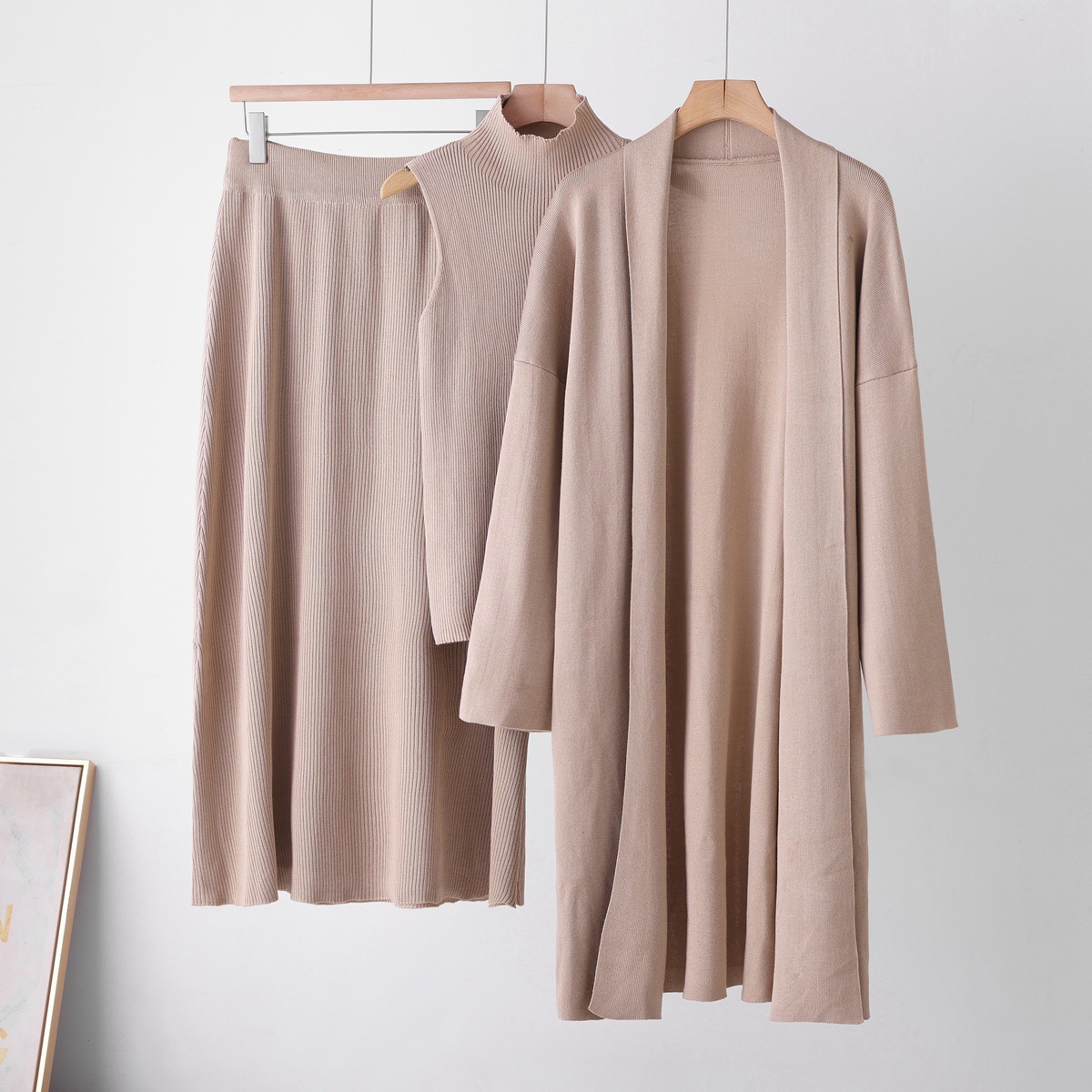 Cross border casual knitted cardigan set for women's autumn and winter new style lazy loose jacket vest half skirt three piece set