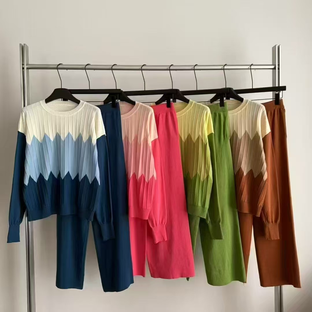 Cross border Korean contrasting vertical pit stripe knitted two-piece set for spring and summer, thin and slim, tall waist and wide leg pants set