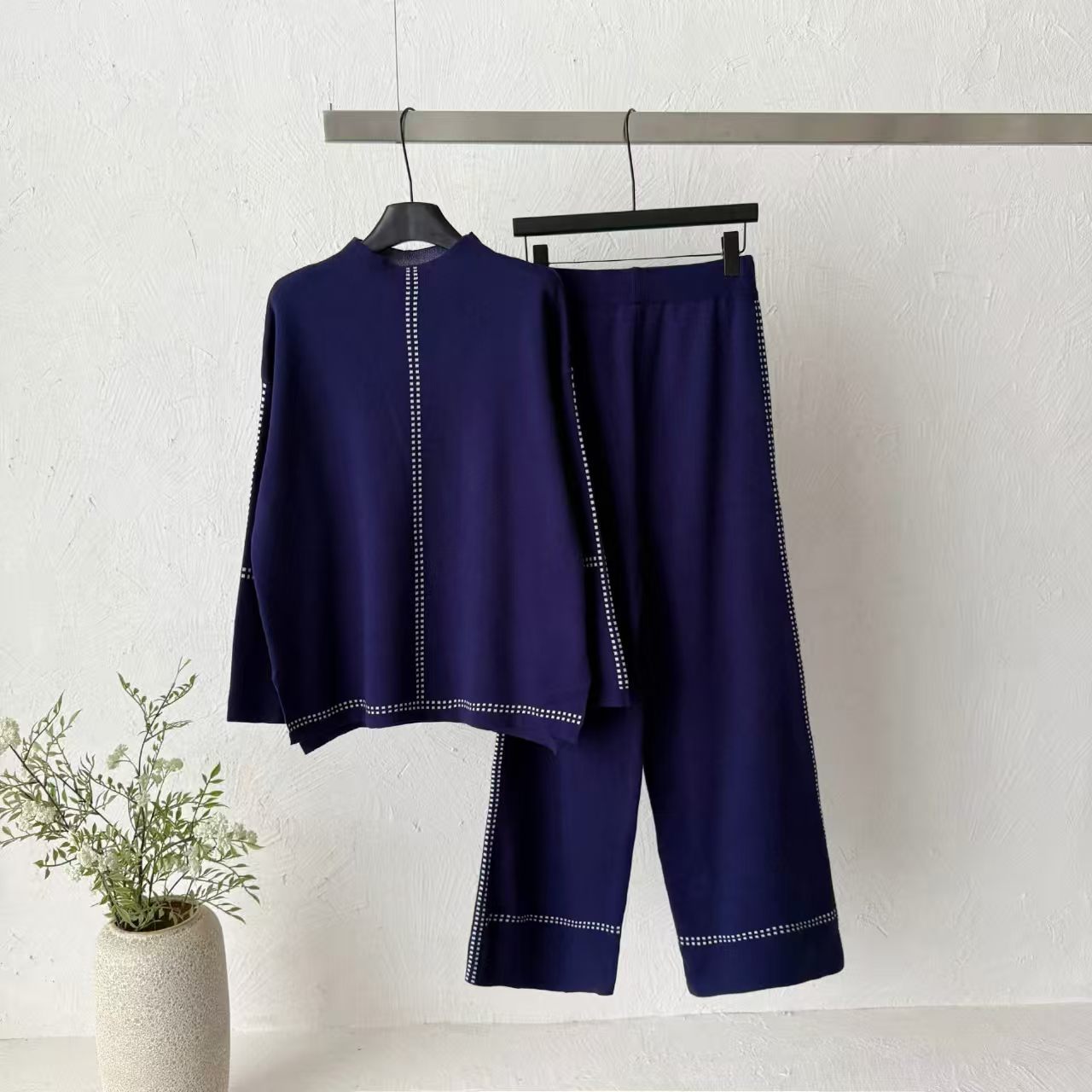 Cross border 2026 new temperament knitted suit women's loose top wide leg pants two-piece set commuting versatile fashion outfit Cross border 2026 new temperament knitted suit women's loose top wide leg pants two-piece set commuting versatile fashion outfit