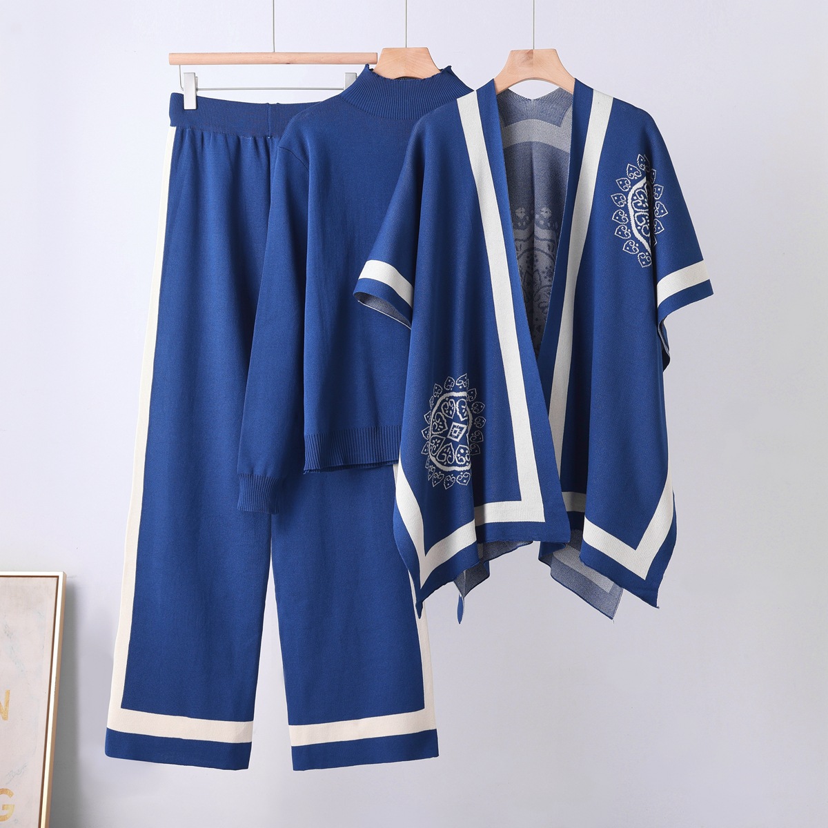Cross border leisure suit women's autumn and winter new style temperament lazy style knitted sweater shawl cape wide leg pants three piece set Cross border leisure suit women's autumn and winter new style temperament lazy style knitted sweater shawl cape wide leg pants three piece set