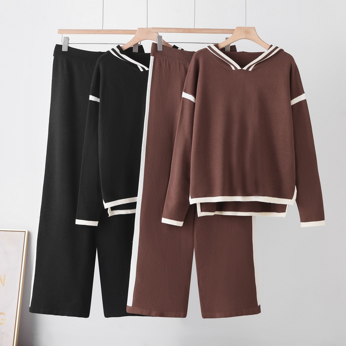 Cross border fashion color blocked hooded knitted suit 2026 women's loose temperament slimming sweater wide leg pants two-piece set Cross border fashion color blocked hooded knitted suit 2026 women's loose temperament slimming sweater wide leg pants two-piece set