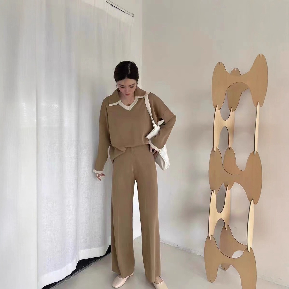 Cross border fashion knitted suit women's casual contrasting color loose long sleeved top high waist split straight leg wide leg two-piece set