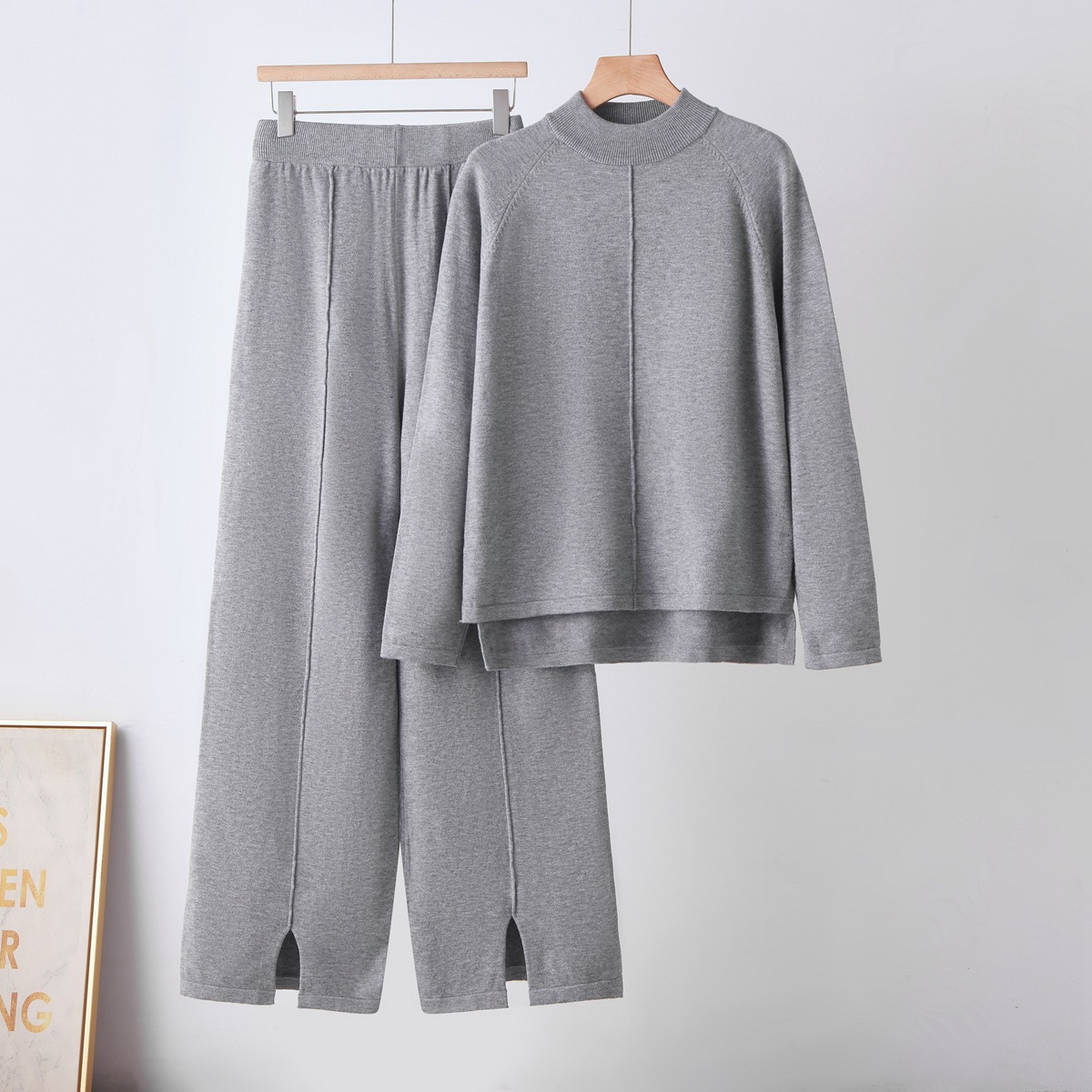 2026 autumn and winter new European and American style loose solid color pullover sweater two-piece set slit knitted wide leg pants set for women