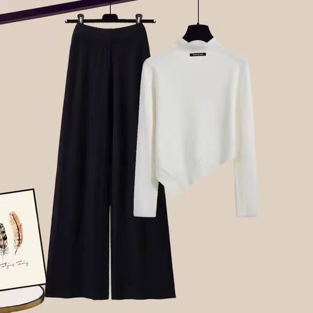 Cross border fashion set for early spring, new women's clothing, irregular sweaters, pants, tea lined tea air knitted two-piece set for women Cross border fashion set for early spring, new women's clothing, irregular sweaters, pants, tea lined tea air knitted two-piece set for women