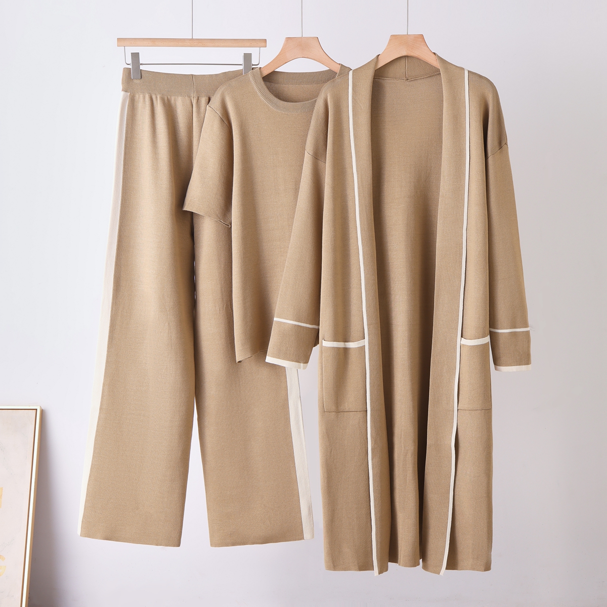 2026 autumn new European and American Amazon cross-border women's clothing color collision comfortable warm and versatile knitted robe three piece set 2026 autumn new European and American Amazon cross-border women's clothing color collision comfortable warm and versatile knitted robe three piece set