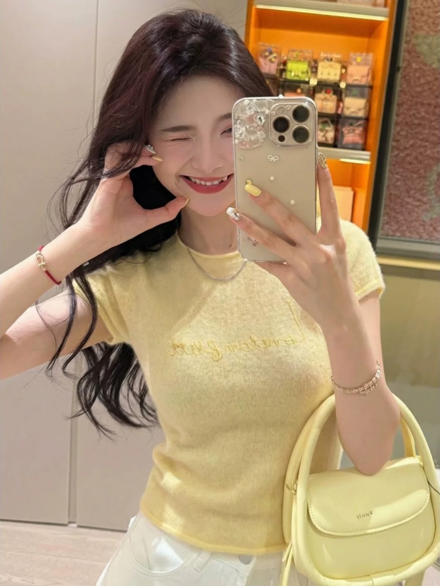 Korean yellow letter shoulder short sleeved T-shirt for women in summer, 2026 super hot, age reducing, huge, beautiful top Korean yellow letter shoulder short sleeved T-shirt for women in summer, 2026 super hot, age reducing, huge, beautiful top