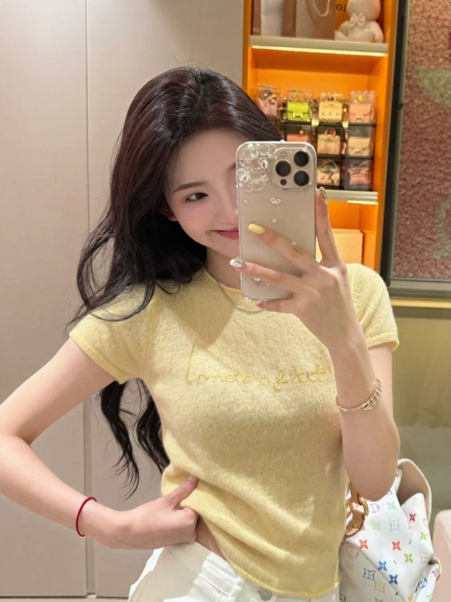 Korean yellow letter shoulder short sleeved T-shirt for women in summer, 2026 super hot, age reducing, huge, beautiful top Korean yellow letter shoulder short sleeved T-shirt for women in summer, 2026 super hot, age reducing, huge, beautiful top