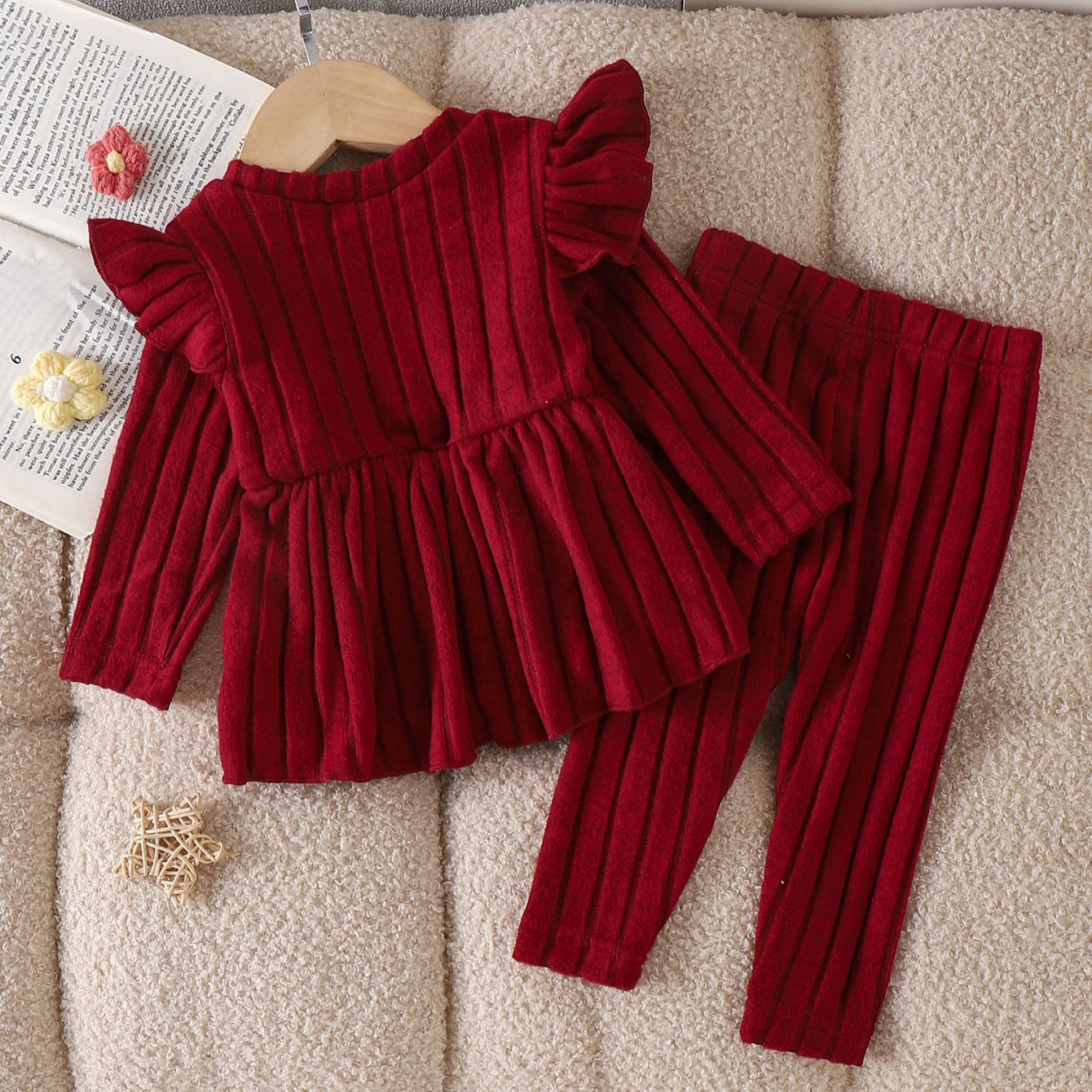 Wine red pit stripe knitted two-piece set with small fly sleeves, three-dimensional hook flower waist cinching skirt top, slim fit leggings