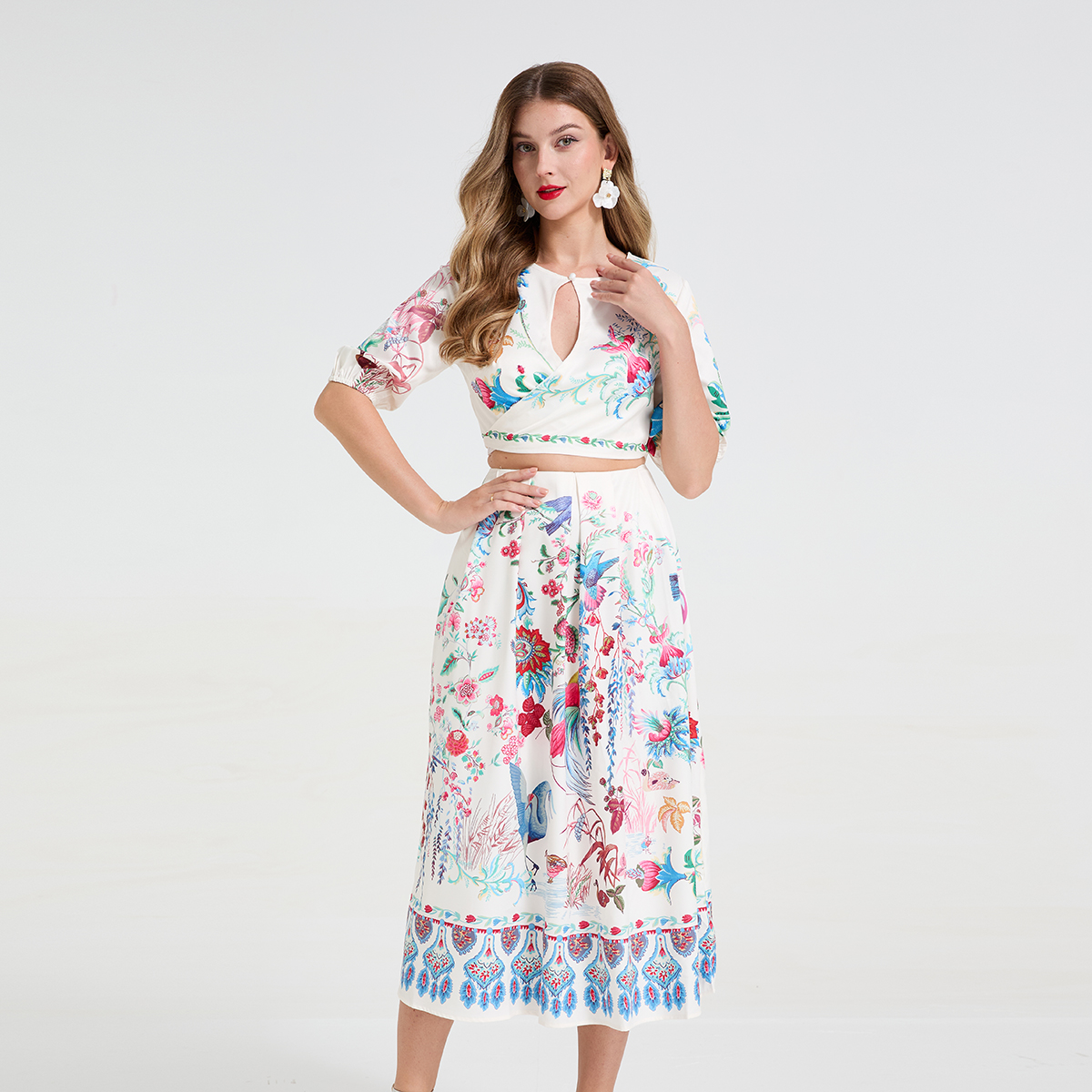 Real time fashion printed hollow out strap round neck mid sleeve top+high waist large swing skirt two-piece set Real time fashion printed hollow out strap round neck mid sleeve top+high waist large swing skirt two-piece set