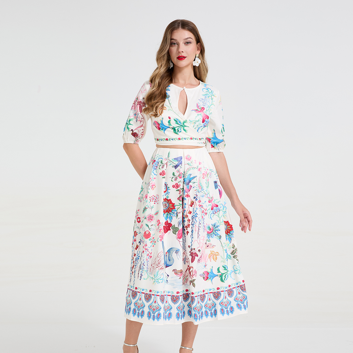 Real time fashion printed hollow out strap round neck mid sleeve top+high waist large swing skirt two-piece set Real time fashion printed hollow out strap round neck mid sleeve top+high waist large swing skirt two-piece set