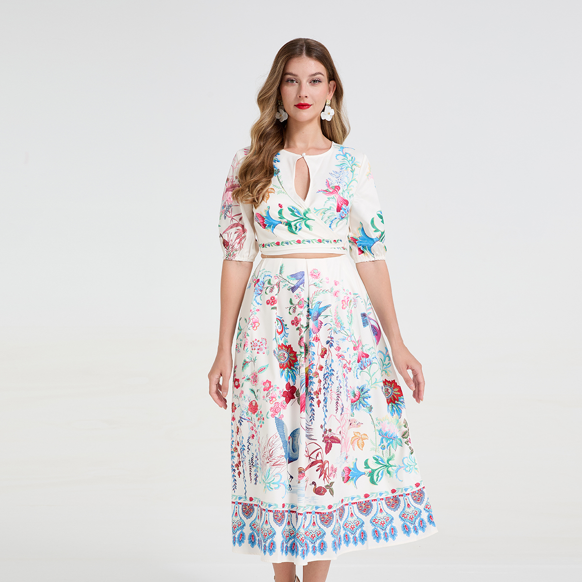 Real time fashion printed hollow out strap round neck mid sleeve top+high waist large swing skirt two-piece set Real time fashion printed hollow out strap round neck mid sleeve top+high waist large swing skirt two-piece set
