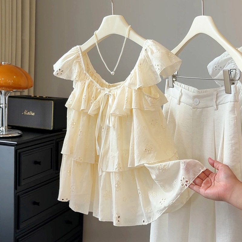 Korean version sweet ruffle edge small fly sleeve shirt for women's summer new style, layered and age reducing versatile sleeveless doll shirt Korean version sweet ruffle edge small fly sleeve shirt for women's summer new style, layered and age reducing versatile sleeveless doll shirt