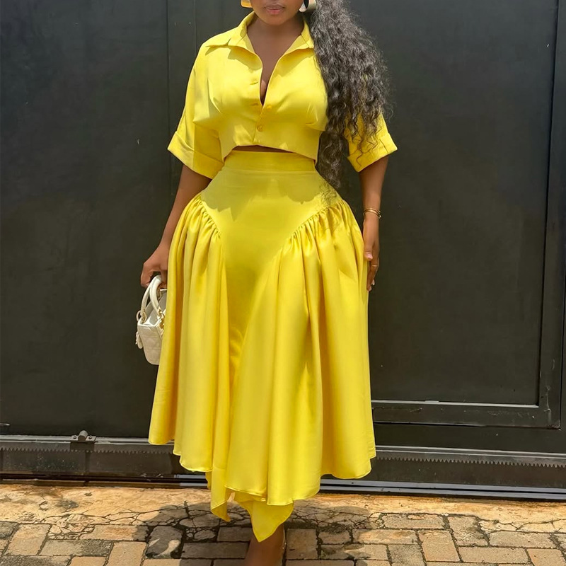 Flip collar short shirt set, skirt with exposed navel top, irregular pleats, big swing skirt, temperament party two-piece set